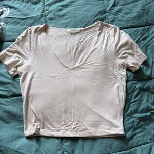 Off white crop top short sleeved.